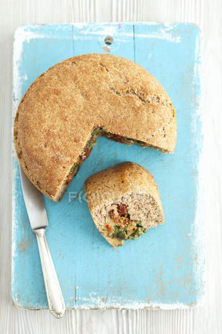 Loaf of bread with spinach — Stock Photo