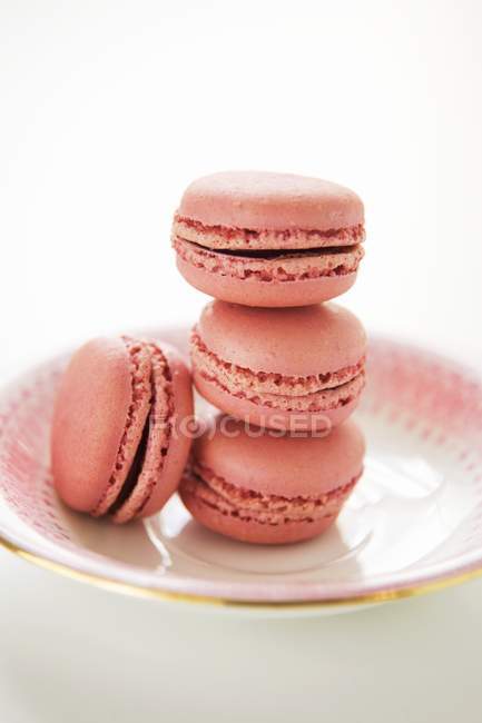 Strawberry macaroons on a plate — Stock Photo