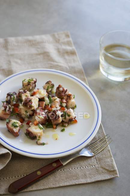 Octopus salad with peppers — Stock Photo