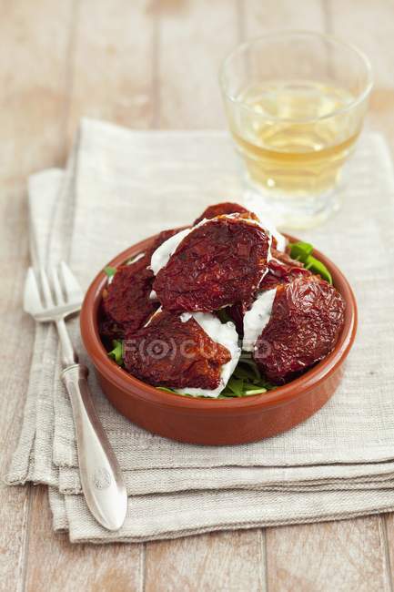 Dried tomatoes with cheese — Stock Photo
