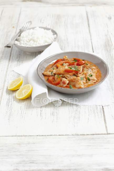 Pollack with pepper and side of rice — Stock Photo