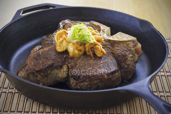 Porterhouse steak with shrimps — Stock Photo