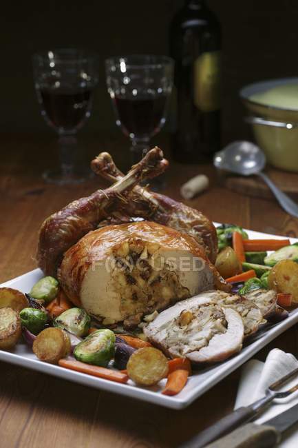Stuffed turkey with a side of vegetables — Stock Photo