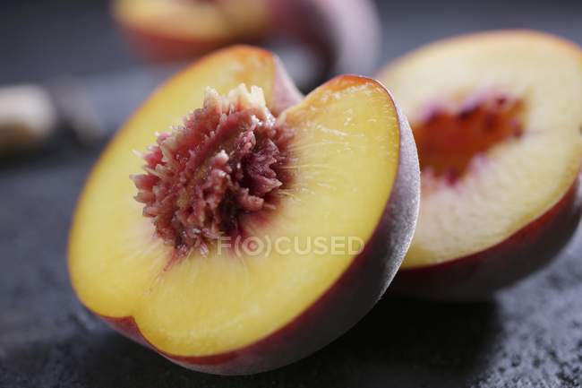 Fresh halved peach — Stock Photo