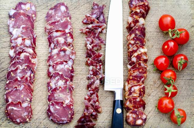 Slices of salami and chorizo — Stock Photo