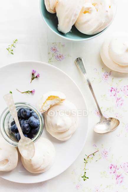 Top  view of rosewater pavlovas with fresh blueberries — Stock Photo