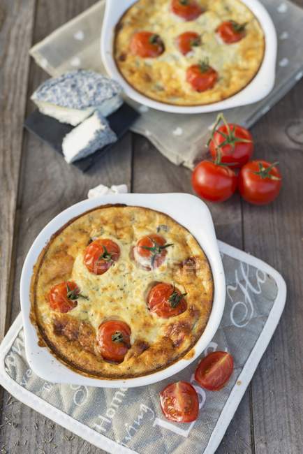 Clafouti with cherry tomatoes — Stock Photo