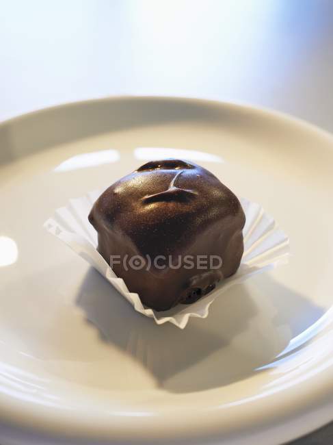 Mundgerechte Brownie mit dunkler Schokoladenglasur — Stockfoto