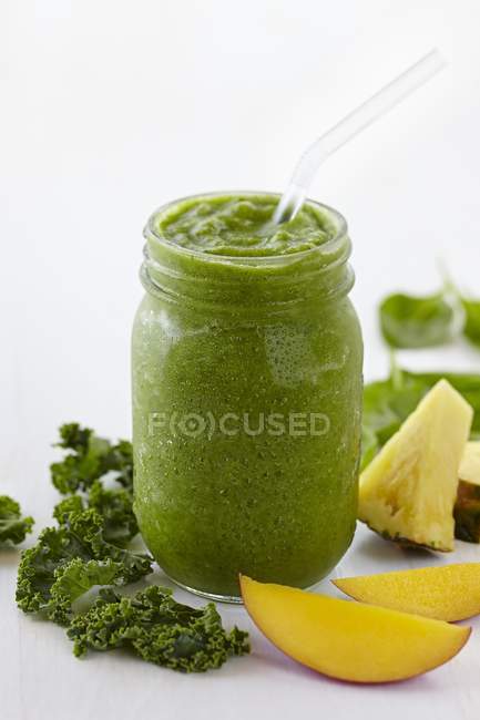 Tropical fruit and smoothie — Stock Photo