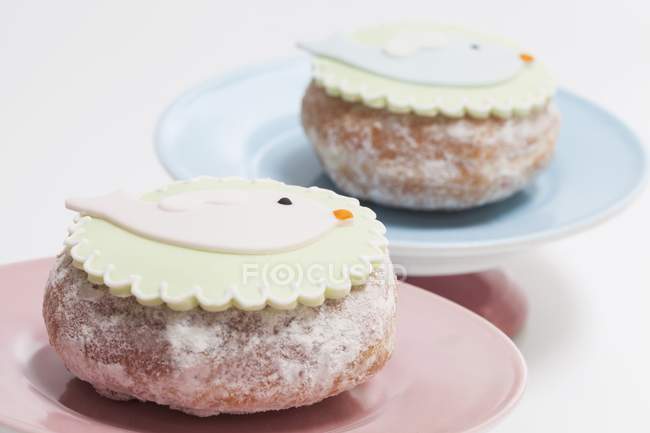 Doughnuts topped with fondant — Stock Photo
