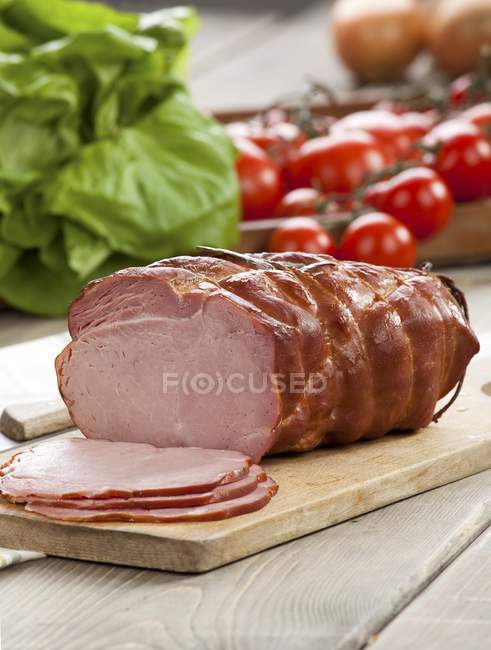 Partly sliced Roasted ham — Stock Photo