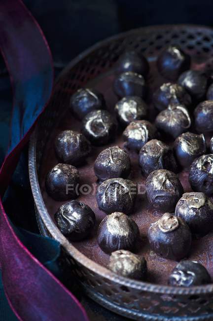 Homemade dark chocolate truffle — Stock Photo