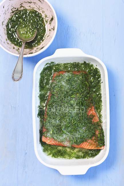 Top view of Gravad lax in herbal sauce — Stock Photo