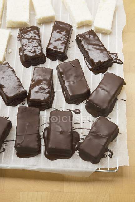 Chocolate-glazed coconut bars — Stock Photo