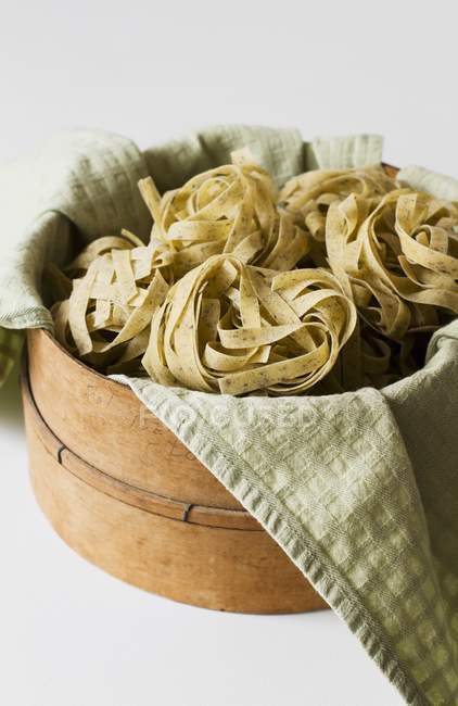 Tagliatelle pasta nests — Stock Photo