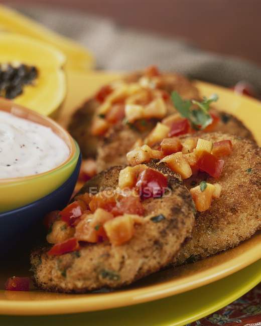 Breaded chicken with salsa — Stock Photo
