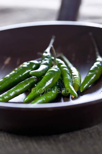 Green chilli peppers — Stock Photo
