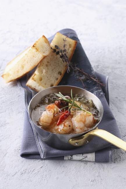 Prawns with chilli peppers — Stock Photo