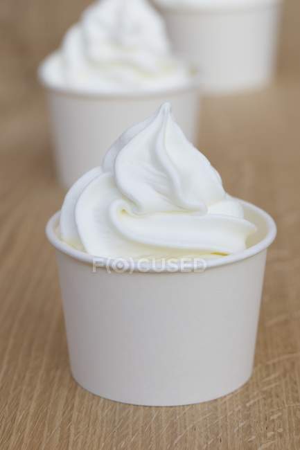 Frozen yoghurt in tubs — Stock Photo