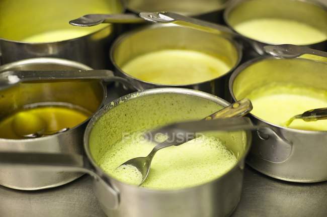 Saucepans of soup in a commercial kitchen — Stock Photo