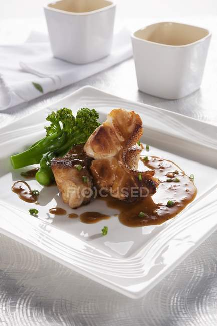 Grilled grouper with teriyaki orange sauce — Stock Photo