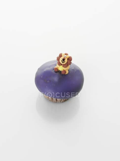 Cupcake decorado com figura de leão — Fotografia de Stock