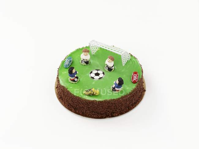 Gâteau décoré de motifs de football — Photo de stock