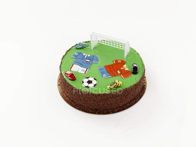 Gâteau décoré de motifs de football — Photo de stock