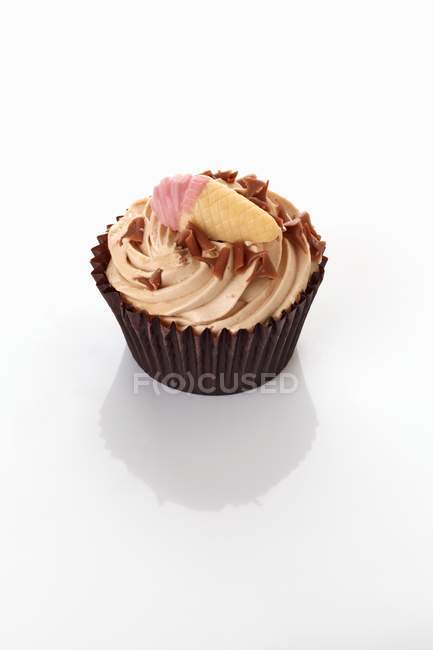 Cupcake decorated with ice cream cone — Stock Photo