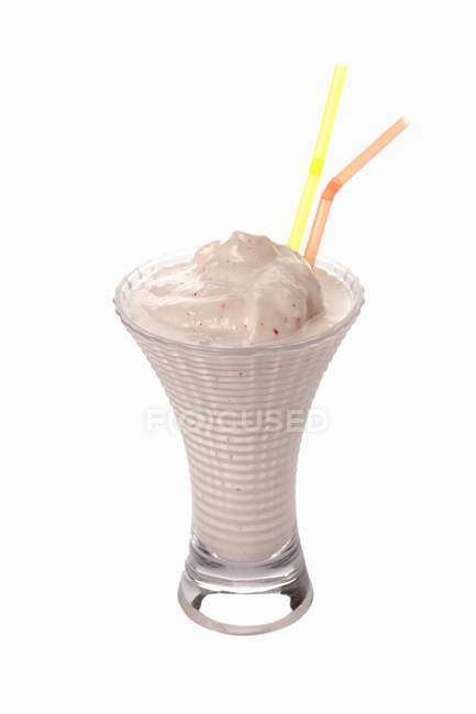 Cream shake with two straws — Stock Photo