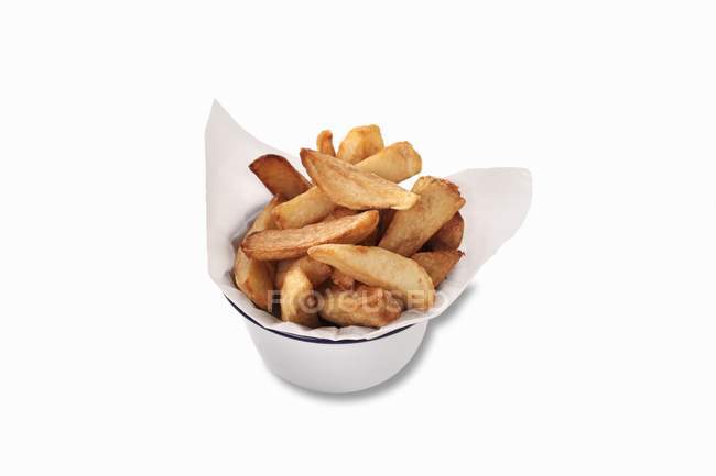 Frites de pommes de terre dans un bol avec serviette — Photo de stock