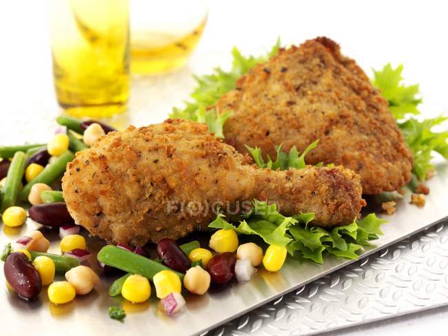 Breaded chicken legs — Stock Photo