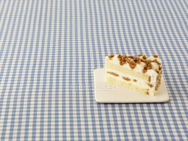 Fetta di cheesecake caramellato — Foto stock