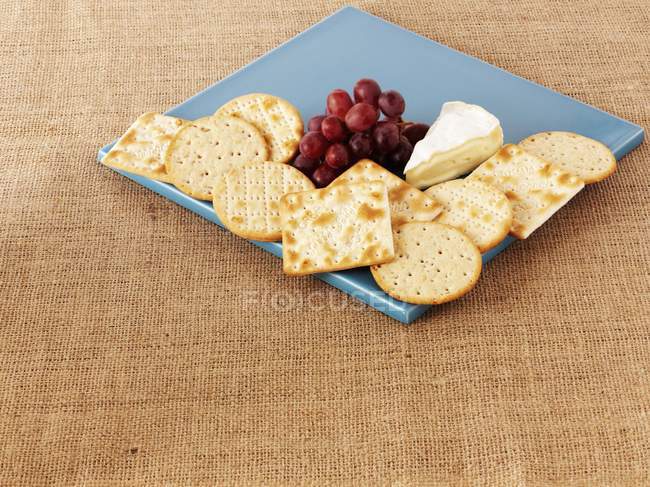 Crackers, Camembert cheese — Stock Photo