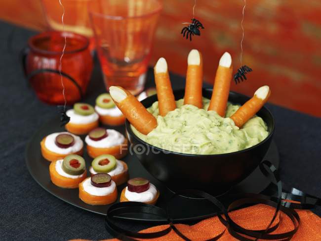 Halloween dip with carrots — Stock Photo