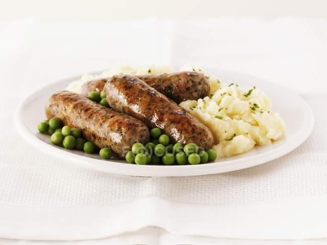 Pork and herb sausages — Stock Photo