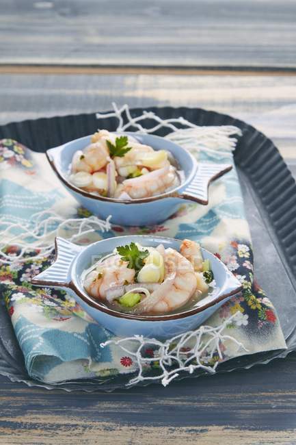 Closeup view of prawn Ceviche with lemons and coriander — Stock Photo