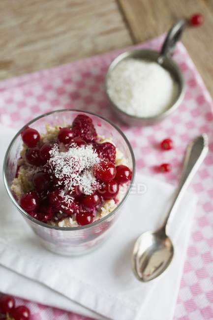 Coconut porridge with raspberries — Stock Photo