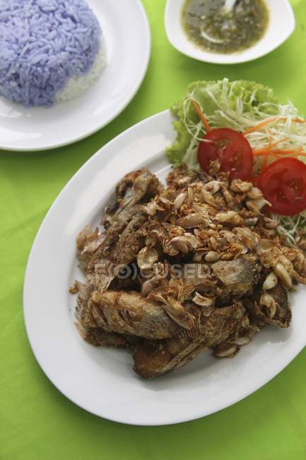 Fried catfish with garlic — Stock Photo