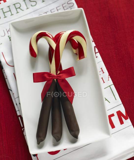 Candy canes dipped in chocolate — Stock Photo