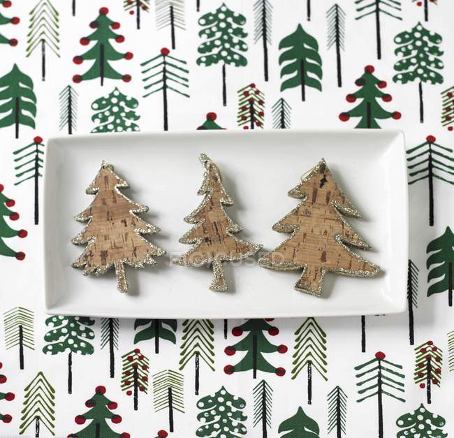 Cork Christmas trees with sliver edge — Stock Photo
