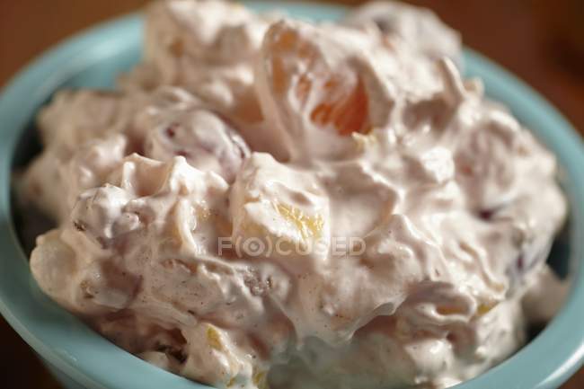 Closeup view of Ambrosia fruit salad with cream — Stock Photo