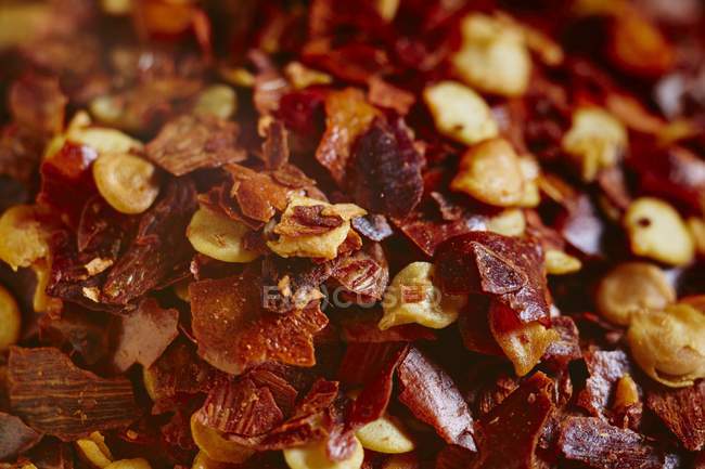 Closeup view of red dry Chilli flakes — Stock Photo