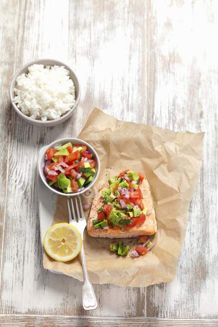 Baked salmon with avocado and rice — Stock Photo