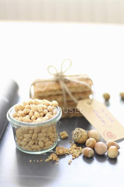 Hazelnuts and muesli bars — Stock Photo
