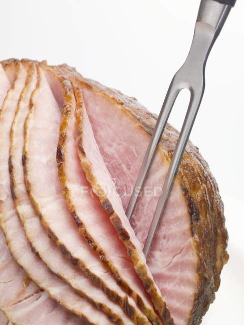 Partly carved Roasted ham — Stock Photo