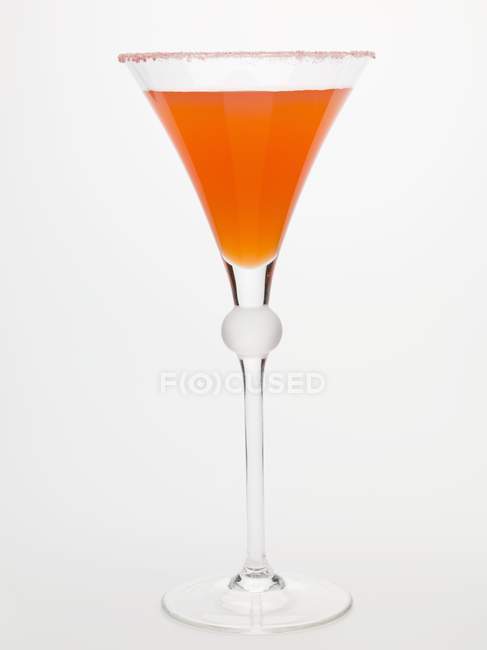 Closeup view of fruit drink in glass with sugared rim — Stock Photo