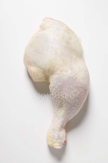 Raw chicken leg — Stock Photo