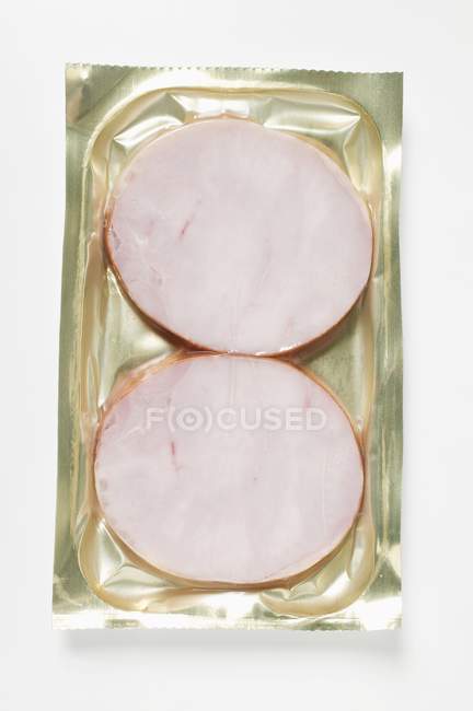 Turkey ham pieces in packaging — Stock Photo
