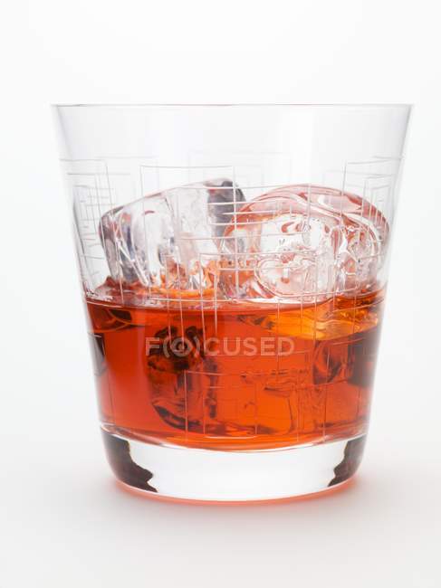 Closeup view of Manhattan cocktail with ice cubes — Stock Photo